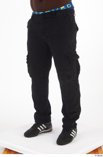 Kato Abimbo black jeans black sneakers casual dressed leg lower…